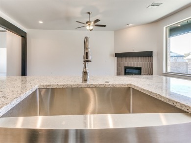 Enjoy entertaining your guests in this bright open living floor on Golf Club At Surrey Hills in Oklahoma - for sale on GolfHomes.com, golf home, golf lot