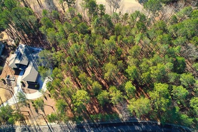 Level golf front home site is gently wooded with lovely tree on Forest Creek Golf Club  in North Carolina - for sale on GolfHomes.com, golf home, golf lot