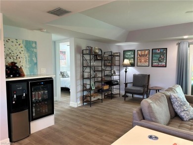 This completely renovated unit offers an open layout with a on The Glades Golf and Country Club in Florida - for sale on GolfHomes.com, golf home, golf lot