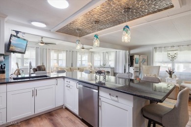 Discover your slice of paradise in this beautifully updated on Pelicans Nest Golf Club in Florida - for sale on GolfHomes.com, golf home, golf lot