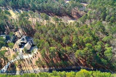 Level golf front home site is gently wooded with lovely tree on Forest Creek Golf Club  in North Carolina - for sale on GolfHomes.com, golf home, golf lot
