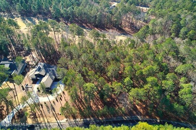 Level golf front home site is gently wooded with lovely tree on Forest Creek Golf Club  in North Carolina - for sale on GolfHomes.com, golf home, golf lot