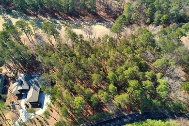 Level golf front home site is gently wooded with lovely tree on Forest Creek Golf Club  in North Carolina - for sale on GolfHomes.com, golf home, golf lot