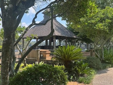 Welcome to your dream waterfront condo just steps away from the on Beau Chene Country Club in Louisiana - for sale on GolfHomes.com, golf home, golf lot