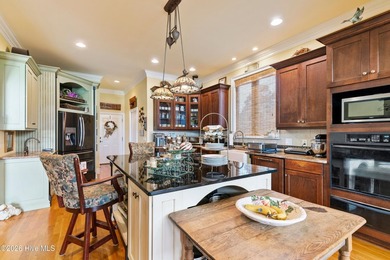 Located in the gated community on a quiet cul de sac, this brick on Members Club At St. James Plantation in North Carolina - for sale on GolfHomes.com, golf home, golf lot