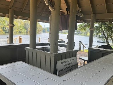 Welcome to your dream waterfront condo just steps away from the on Beau Chene Country Club in Louisiana - for sale on GolfHomes.com, golf home, golf lot