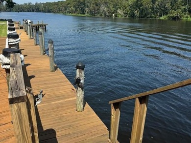 Welcome to your dream waterfront condo just steps away from the on Beau Chene Country Club in Louisiana - for sale on GolfHomes.com, golf home, golf lot