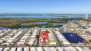 Discover your slice of paradise in this beautifully updated on Pelicans Nest Golf Club in Florida - for sale on GolfHomes.com, golf home, golf lot