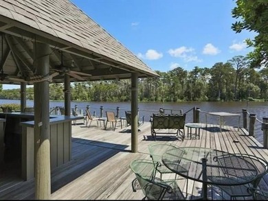 Welcome to your dream waterfront condo just steps away from the on Beau Chene Country Club in Louisiana - for sale on GolfHomes.com, golf home, golf lot