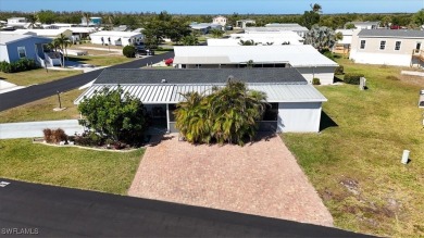 Discover your slice of paradise in this beautifully updated on Pelicans Nest Golf Club in Florida - for sale on GolfHomes.com, golf home, golf lot