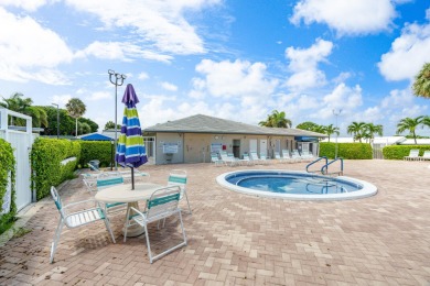 Your Florida oasis awaits here at Palm Beach Leisureville! This on Leisureville Community Golf Course in Florida - for sale on GolfHomes.com, golf home, golf lot