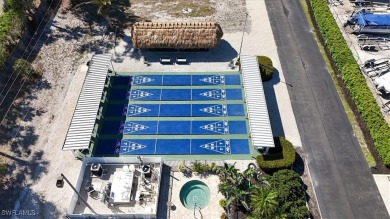 Discover your slice of paradise in this beautifully updated on Pelicans Nest Golf Club in Florida - for sale on GolfHomes.com, golf home, golf lot