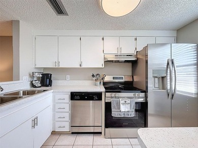 Enjoy peaceful golf course living in the highly sought-after on Seven Springs Golf and Country Club in Florida - for sale on GolfHomes.com, golf home, golf lot