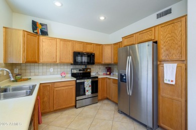 Welcome Home to this 1270 sq/ft home. This Arcadia model has a on Arizona Traditions Golf Club in Arizona - for sale on GolfHomes.com, golf home, golf lot