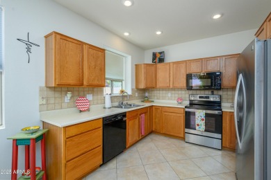Welcome Home to this 1270 sq/ft home. This Arcadia model has a on Arizona Traditions Golf Club in Arizona - for sale on GolfHomes.com, golf home, golf lot