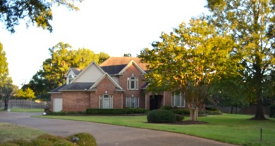 This executive brick home with four bedrooms, three and half on TPC at Southwind in Tennessee - for sale on GolfHomes.com, golf home, golf lot