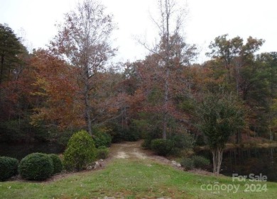 Nearly 5 acre parcel with two ponds, lush foliage and abundant on The Cliffs Valley Golf Course in South Carolina - for sale on GolfHomes.com, golf home, golf lot