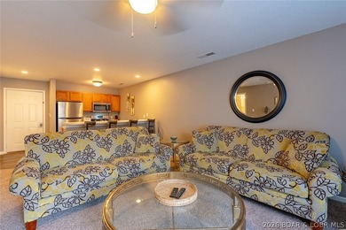 Turn-key, fully furnished and beautifully updated-this oversized on Osage National Golf Club in Missouri - for sale on GolfHomes.com, golf home, golf lot