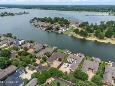 NEW PRICE on this WATERFRONT property on gated Belle Pointe of on Lake Caroline Golf Club in Mississippi - for sale on GolfHomes.com, golf home, golf lot