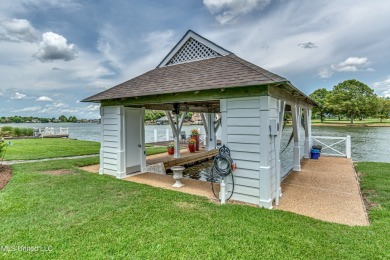 NEW PRICE on this WATERFRONT property on gated Belle Pointe of on Lake Caroline Golf Club in Mississippi - for sale on GolfHomes.com, golf home, golf lot