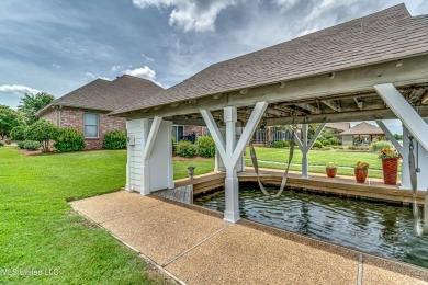 NEW PRICE on this WATERFRONT property on gated Belle Pointe of on Lake Caroline Golf Club in Mississippi - for sale on GolfHomes.com, golf home, golf lot