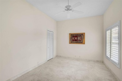 Discover this well-maintained 3BR/2BA Patio home with a private on Peridia Golf and Country Club in Florida - for sale on GolfHomes.com, golf home, golf lot