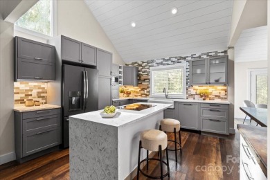 Stunning home with almost 1/2 acre of direct, fantastic views of on Raintree Country Club in North Carolina - for sale on GolfHomes.com, golf home, golf lot