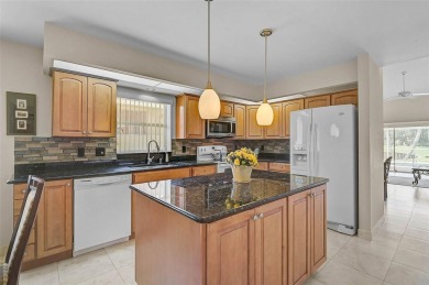 Discover this well-maintained 3BR/2BA Patio home with a private on Peridia Golf and Country Club in Florida - for sale on GolfHomes.com, golf home, golf lot