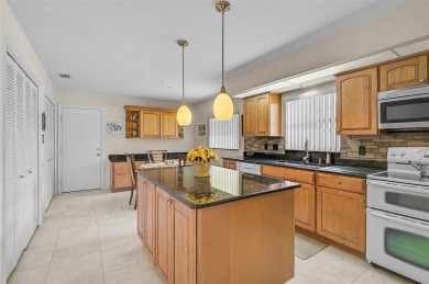 Discover this well-maintained 3BR/2BA Patio home with a private on Peridia Golf and Country Club in Florida - for sale on GolfHomes.com, golf home, golf lot