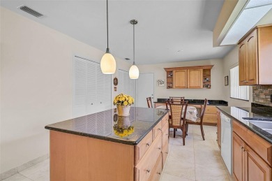Discover this well-maintained 3BR/2BA Patio home with a private on Peridia Golf and Country Club in Florida - for sale on GolfHomes.com, golf home, golf lot