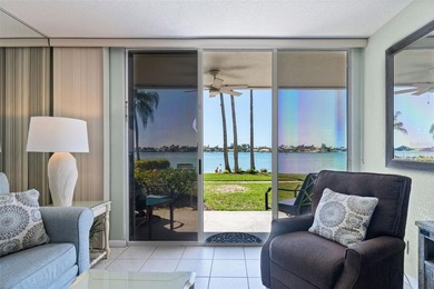 Welcome to your coastal retreat in beautiful Isla del Sol. This on Isla Del Sol Yacht and Country Club in Florida - for sale on GolfHomes.com, golf home, golf lot