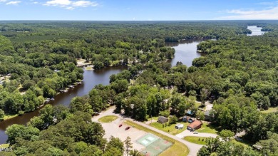 Elegant Ranch Home at Lake Royale's River Golf Club Course on River Golf and County Club at Lake Royale in North Carolina - for sale on GolfHomes.com, golf home, golf lot