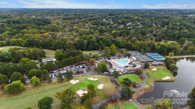 Stunning home with almost 1/2 acre of direct, fantastic views of on Raintree Country Club in North Carolina - for sale on GolfHomes.com, golf home, golf lot