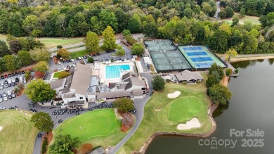 Stunning home with almost 1/2 acre of direct, fantastic views of on Raintree Country Club in North Carolina - for sale on GolfHomes.com, golf home, golf lot