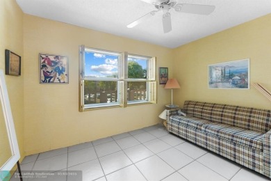 Welcome to this spacious 2-bed, 2-bath condo in the heart of on Sunrise Lakes Phase III in Florida - for sale on GolfHomes.com, golf home, golf lot