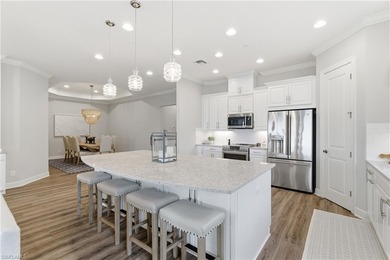 FULL GOLF MEMBERSHIP is included with this meticulous and on Esplanade Golf and  Country Club in Florida - for sale on GolfHomes.com, golf home, golf lot