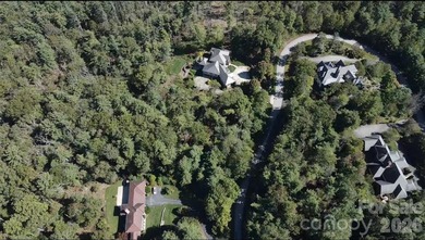 Discover a rare and exceptional opportunity to build your custom on Biltmore Forest Country Club in North Carolina - for sale on GolfHomes.com, golf home, golf lot