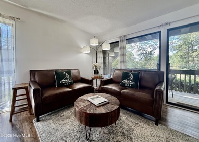 This first floor St. Andrews 2-bedroom, 2-bathroom lakefront on Pinehurst Resort and Country Club in North Carolina - for sale on GolfHomes.com, golf home, golf lot