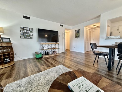 This first floor St. Andrews 2-bedroom, 2-bathroom lakefront on Pinehurst Resort and Country Club in North Carolina - for sale on GolfHomes.com, golf home, golf lot