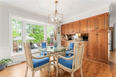 Situated on the 14th green of the newly renovated Forest Oaks on Forest Oaks Country Club in North Carolina - for sale on GolfHomes.com, golf home, golf lot