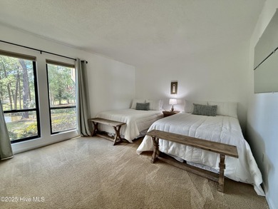 This first floor St. Andrews 2-bedroom, 2-bathroom lakefront on Pinehurst Resort and Country Club in North Carolina - for sale on GolfHomes.com, golf home, golf lot