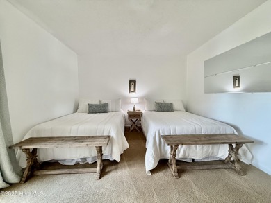 This first floor St. Andrews 2-bedroom, 2-bathroom lakefront on Pinehurst Resort and Country Club in North Carolina - for sale on GolfHomes.com, golf home, golf lot