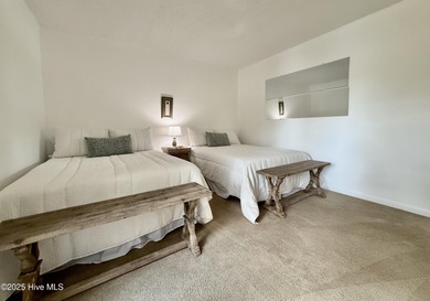 This first floor St. Andrews 2-bedroom, 2-bathroom lakefront on Pinehurst Resort and Country Club in North Carolina - for sale on GolfHomes.com, golf home, golf lot