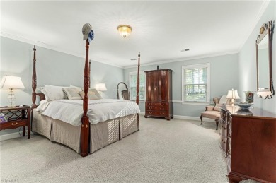 Situated on the 14th green of the newly renovated Forest Oaks on Forest Oaks Country Club in North Carolina - for sale on GolfHomes.com, golf home, golf lot