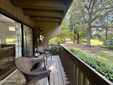 This first floor St. Andrews 2-bedroom, 2-bathroom lakefront on Pinehurst Resort and Country Club in North Carolina - for sale on GolfHomes.com, golf home, golf lot