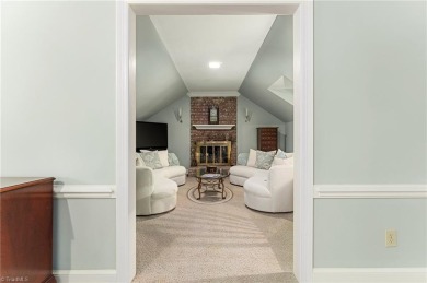 Situated on the 14th green of the newly renovated Forest Oaks on Forest Oaks Country Club in North Carolina - for sale on GolfHomes.com, golf home, golf lot