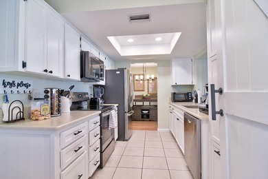 LOCATION, location, location! Welcome home to the highly on Mainlands Golf Club in Florida - for sale on GolfHomes.com, golf home, golf lot