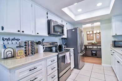 LOCATION, location, location! Welcome home to the highly on Mainlands Golf Club in Florida - for sale on GolfHomes.com, golf home, golf lot