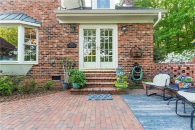 Situated on the 14th green of the newly renovated Forest Oaks on Forest Oaks Country Club in North Carolina - for sale on GolfHomes.com, golf home, golf lot