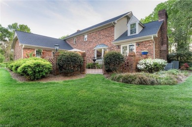 Situated on the 14th green of the newly renovated Forest Oaks on Forest Oaks Country Club in North Carolina - for sale on GolfHomes.com, golf home, golf lot